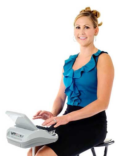 Court reporter at a stenography machine